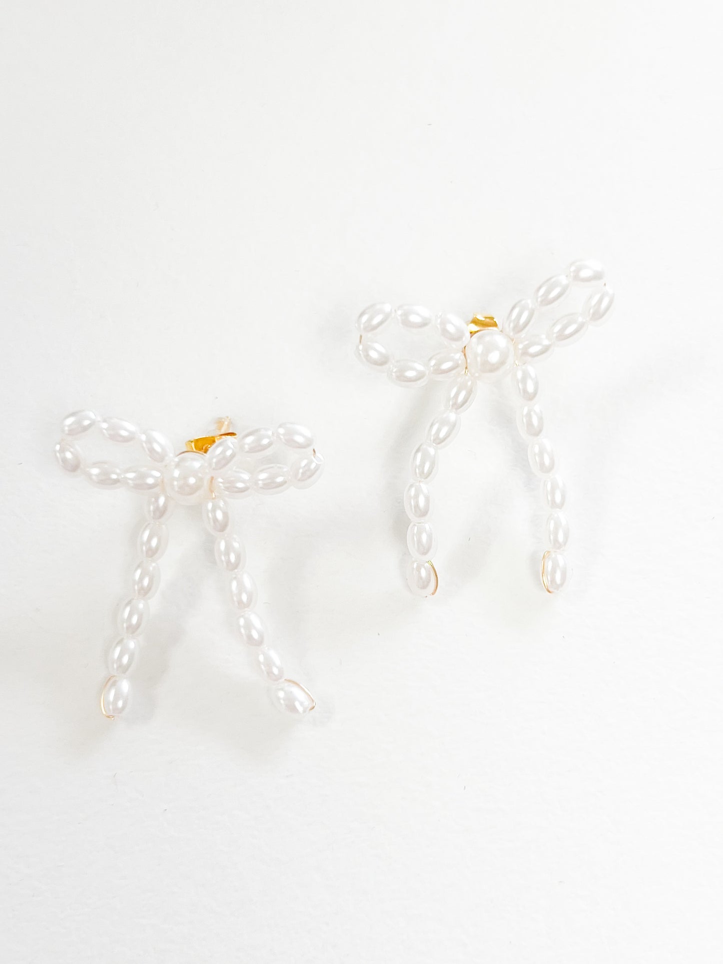 pearl bow earrings